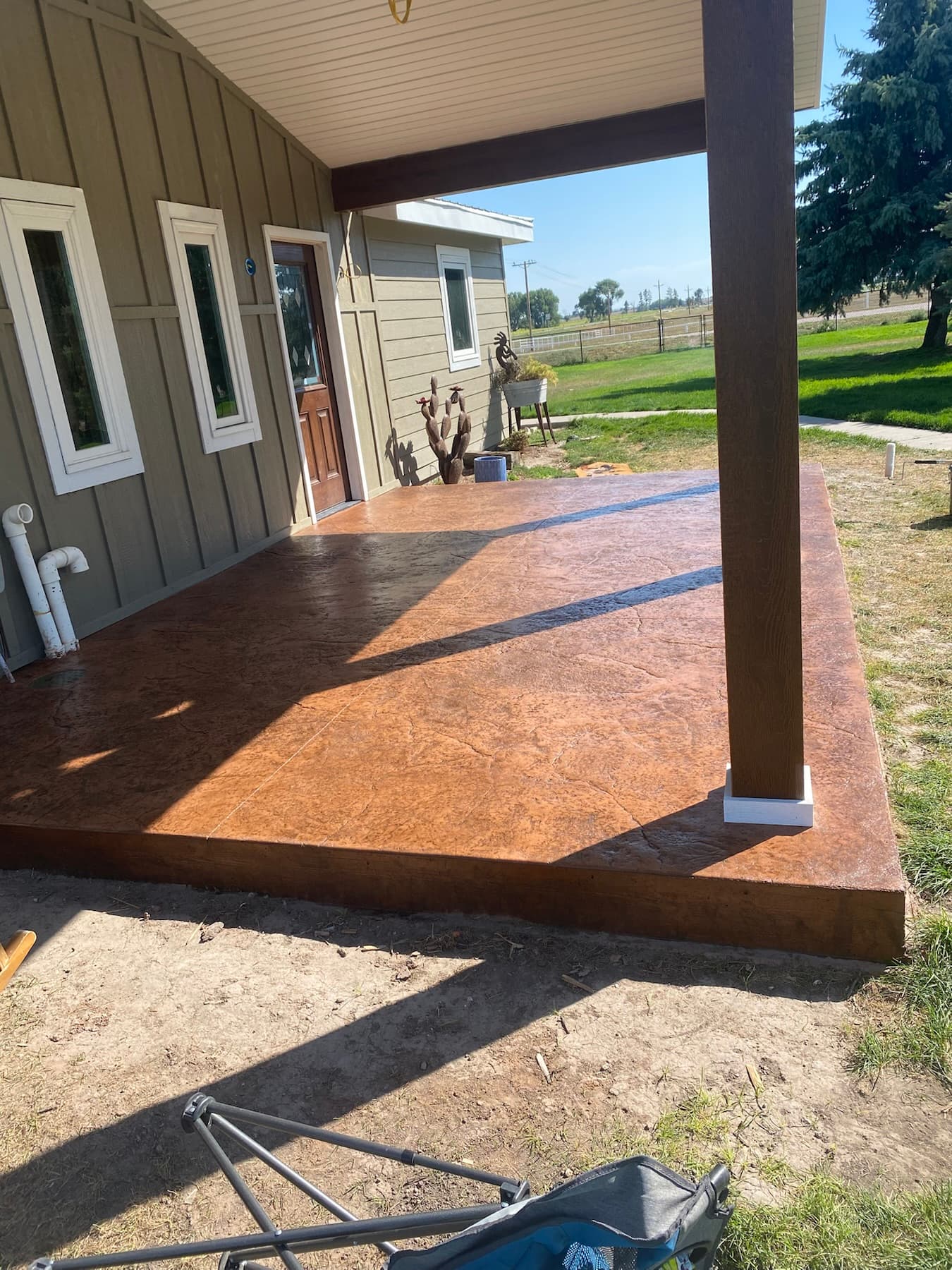Stained concrete covered patio on a home